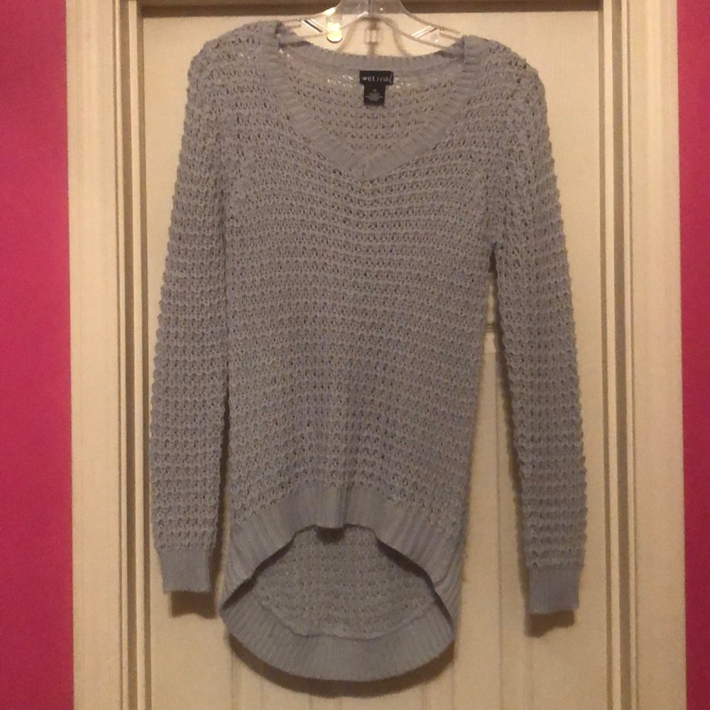 A cable-knit sweater.